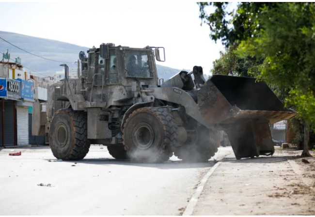 Israeli military storms West Bank towns as demolition displaces dozens