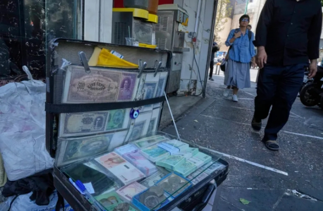 Protests, strikes erupt as Iran reels from deepening economic crisis, currency collapse
