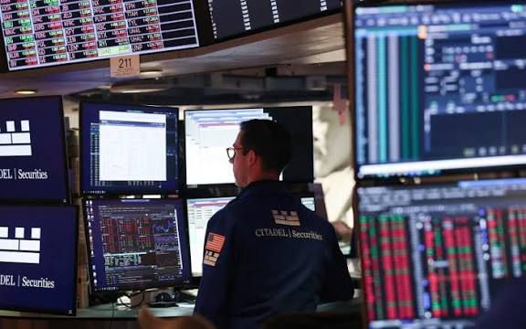 Stocks, dollar, treasuries slide on US-Europe trade tensions