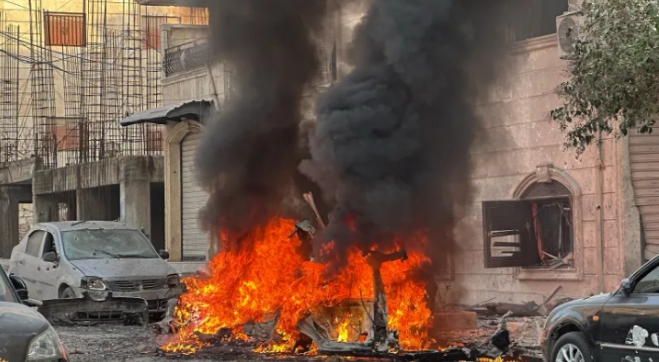 Syrian Army shells SDF positions in Aleppo as thousands flee
