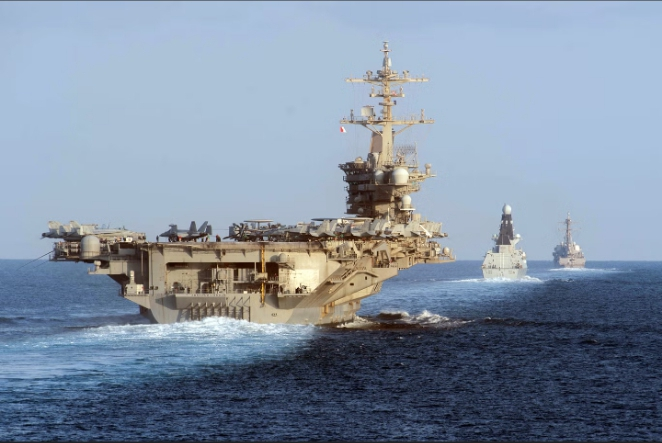 Trump Iran war strategy faces global backlash as US Armada threatens Tehran while Ukraine support collapses