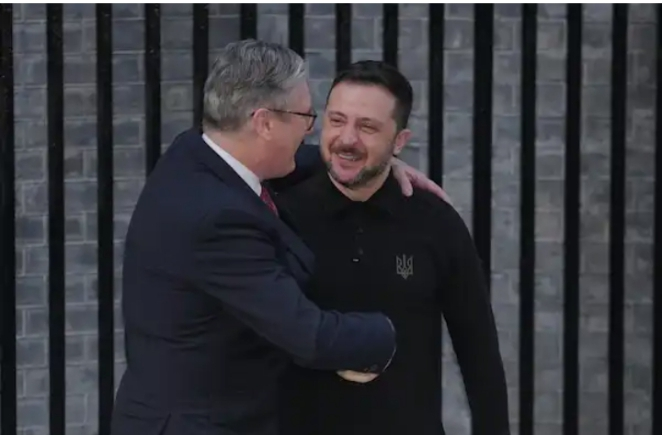 UK pledges £540m weapons package for Ukraine as Russian drone strikes plunge cities into darkness