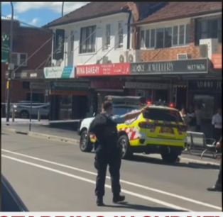 Man killed and two critically injured in random triple stabbing on Sydney suburban high street