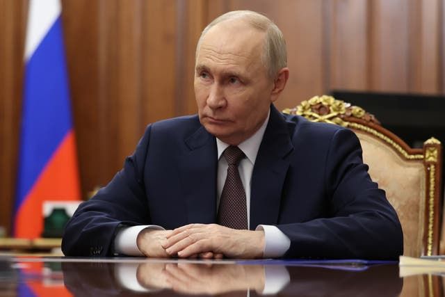 Russia warns foreigners to leave Kyiv as Putin threatens massive revenge strikes