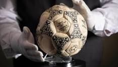 Maradona’s hand of God ball sells for £2.5m at auction